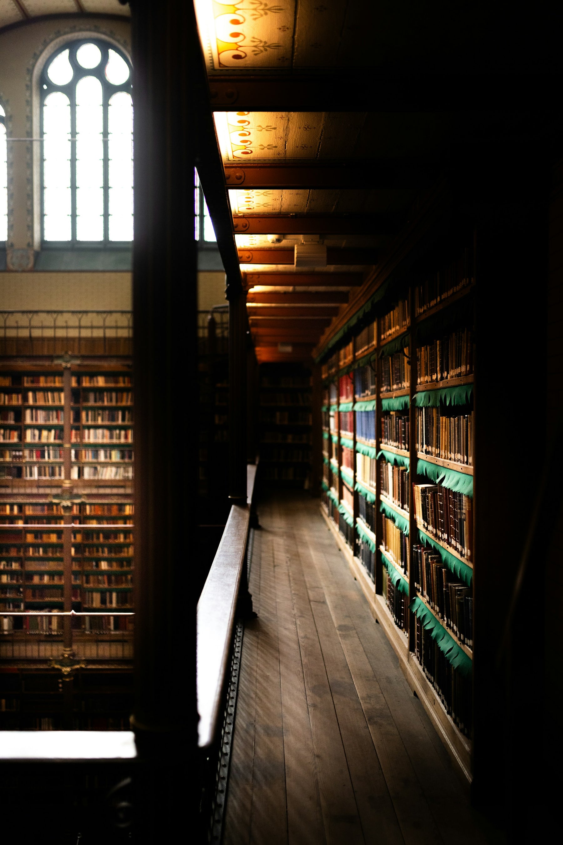 Historic research library with long rows of reference books